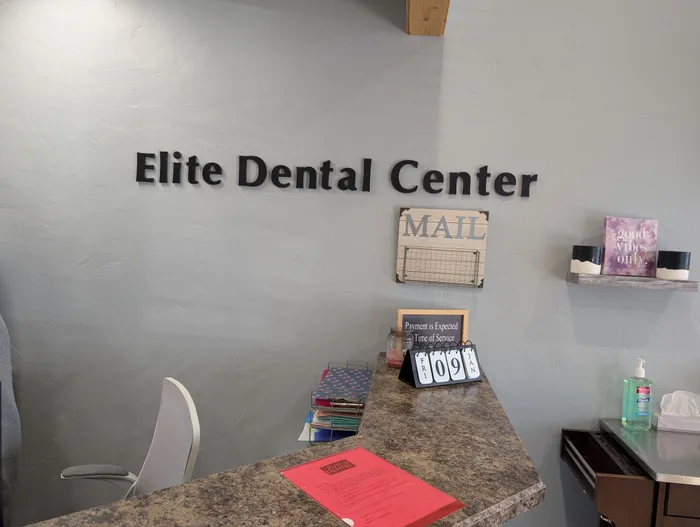Comfortable patient waiting area with modern amenities at Elite Dental Center